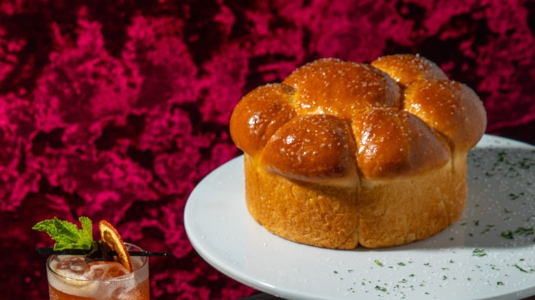 Parker House rolls on a plate at Morrow Steak
