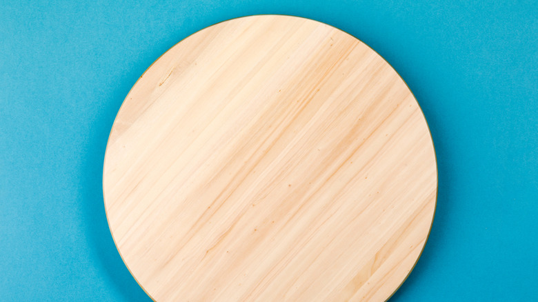 lazy susan tray on turquoise background