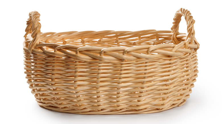 wicker basket on white background