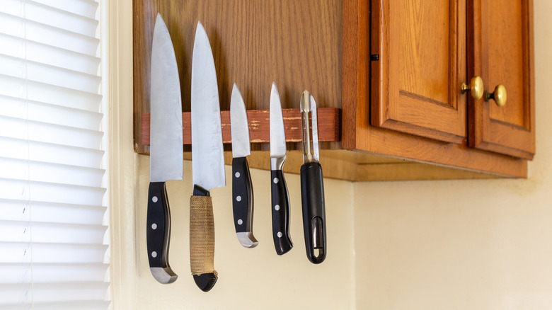 knives sticking to magnetized metal strip