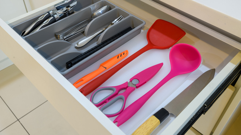 kitchen drawer with supplies inside