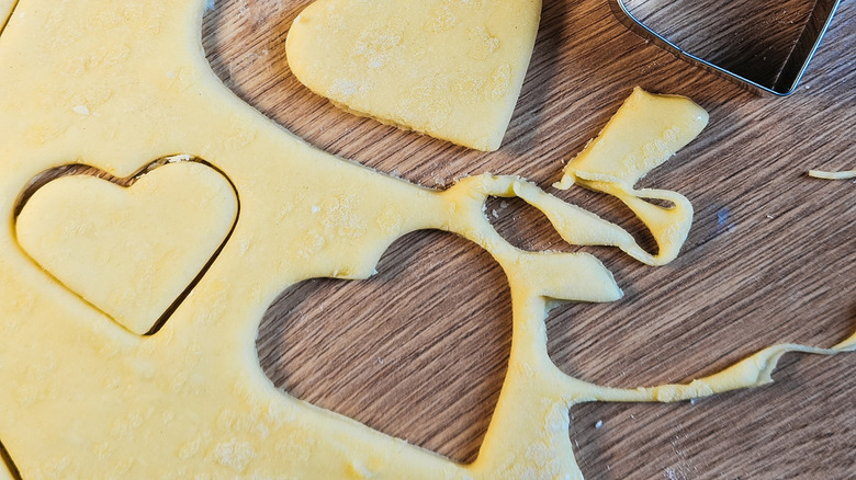 heart shaped cookie cutters and dough