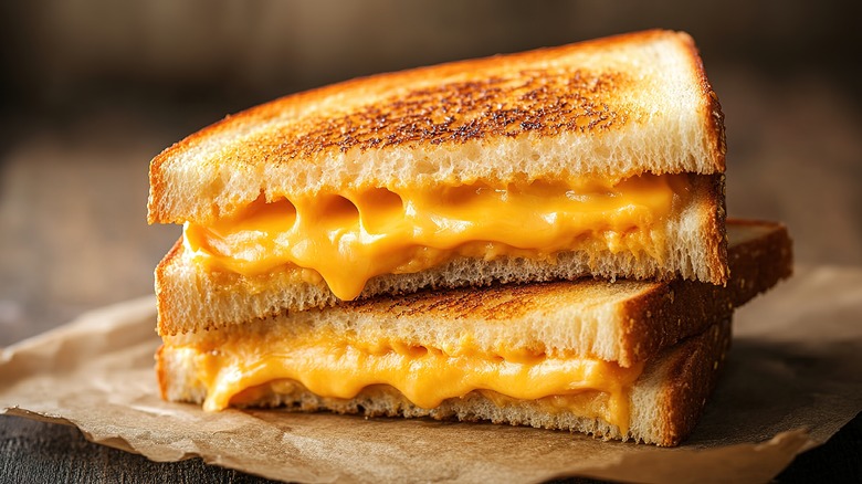 melting grilled cheese sandwich brown paper