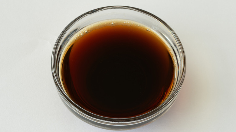 Ponzu sauce in a small glass bowl