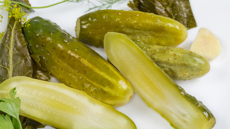 Whole pickles with herbs