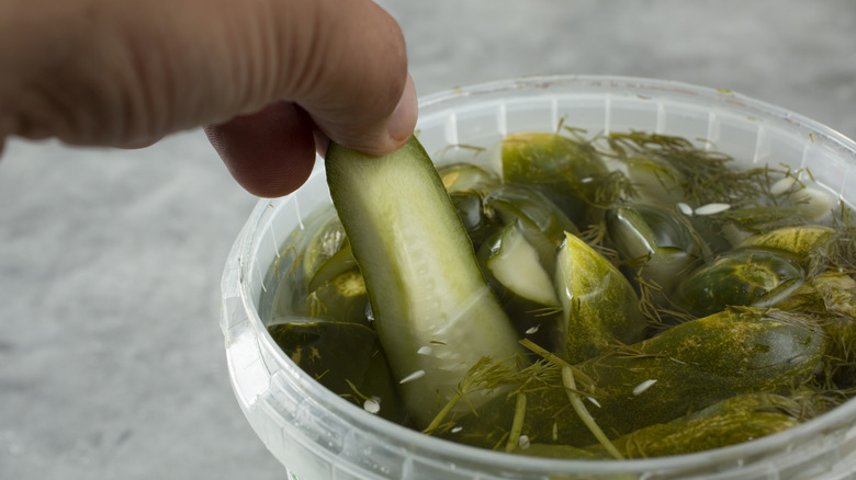 Pickles in a plastic container
