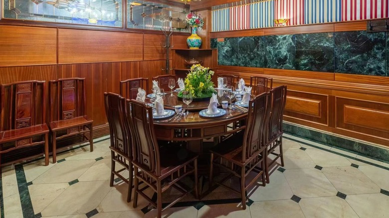 The dining room at Congee Village with an impressively set wooden table