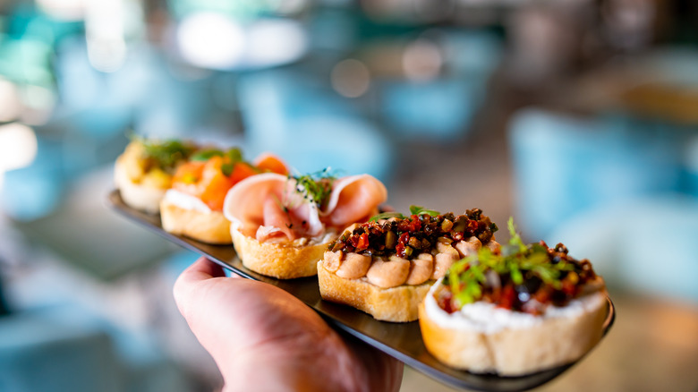 Bruschetta on a plate with topping