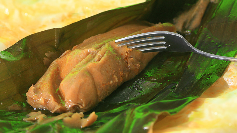 Fork cutting into a pastel