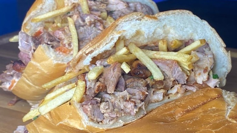 Stack of three tripleta sandwiches with Puerto Rico flag toothpick