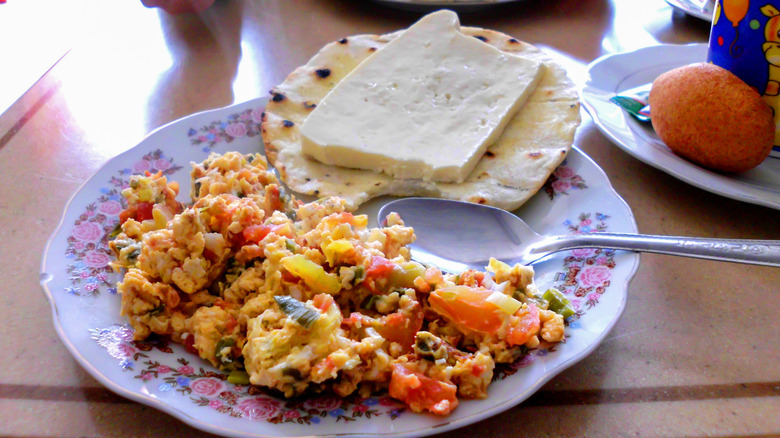 A plate of South American perico on a table