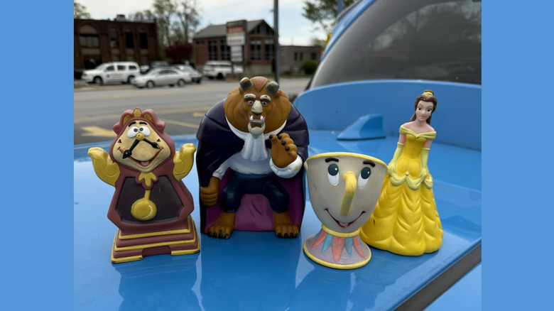 1992 Beauty and the Beast hand puppets from Pizza Hut, in a line
