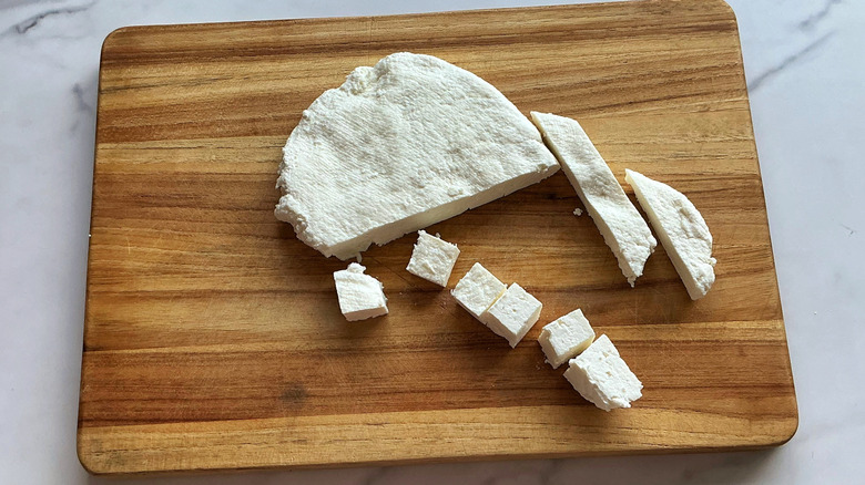 disk of paneer cut into cubes and strips