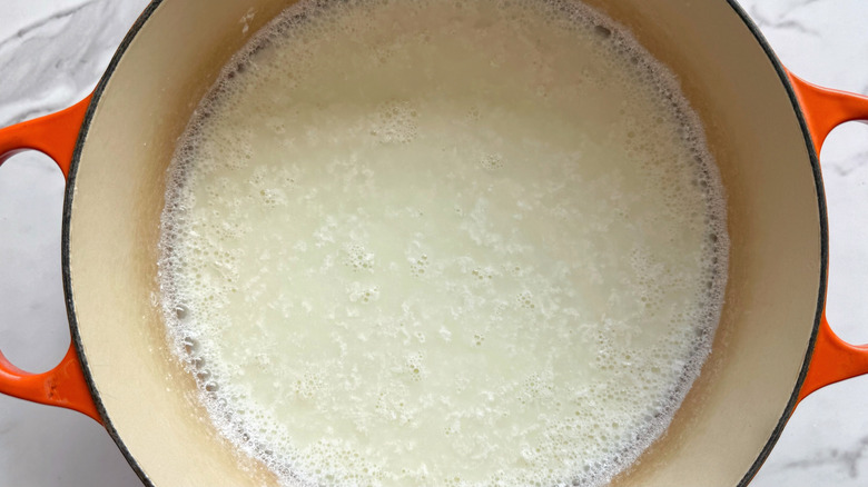 pot of milk beginning to curdle