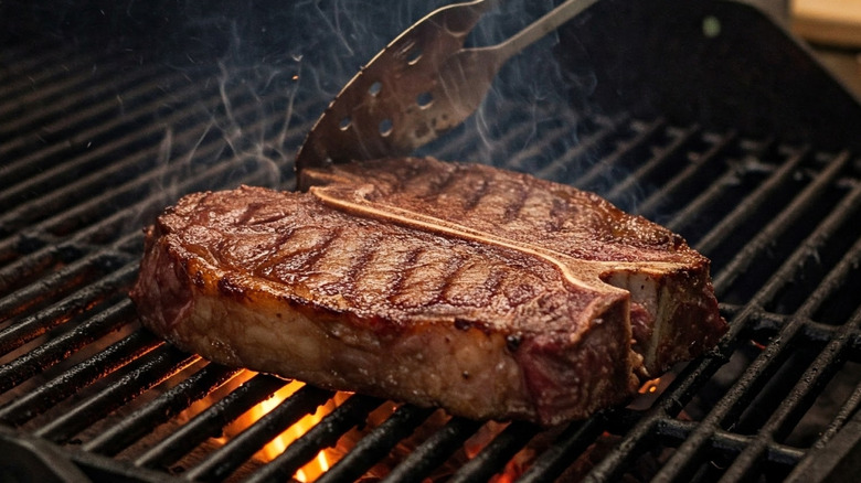 Steak searing on the grill