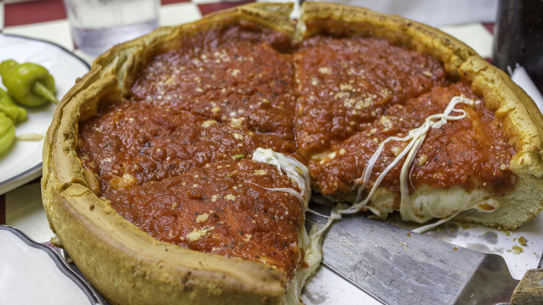 Partially eaten Chicago-style deep dish pizza