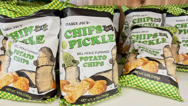 Bags of pickle chips on a shelf at Trader Joe's