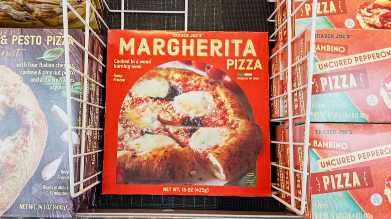 A box of margherita pizza in the freezer aisle at Trader Joe's