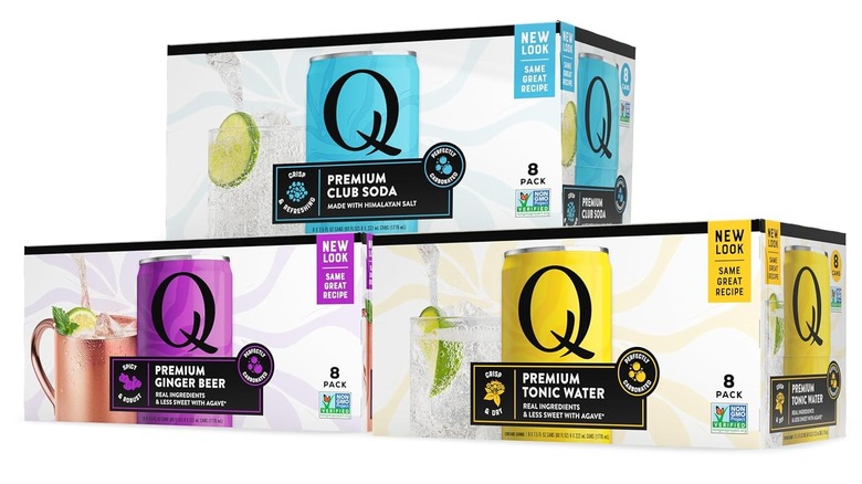 Three boxes of Q club soda, ginger beer, and tonic.