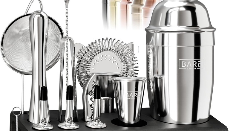 A cocktail making set inclusing a shaker, strainer, spoon, and more.