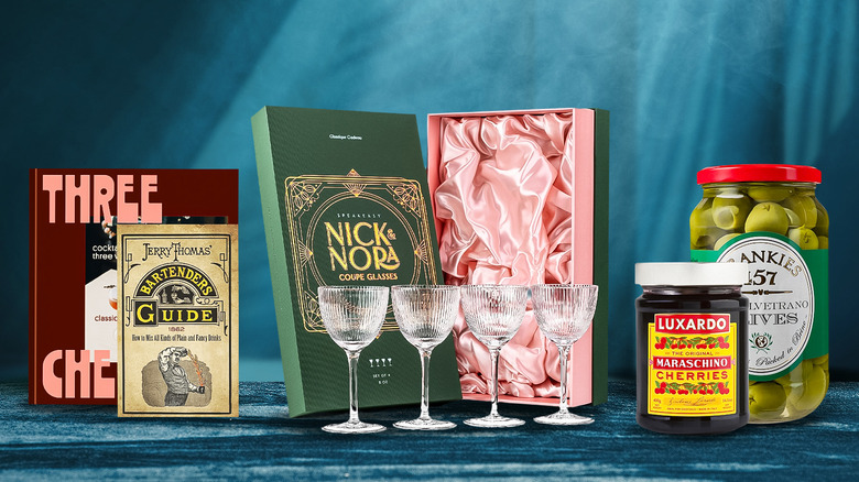 A composit image of gifts like cocktail books, glases, cherries, and olives.
