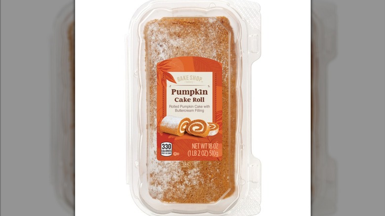Bake Shop Pumpkin Cake Roll in a plastic clamshell container.