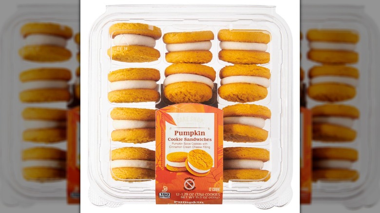 Bake Shop Pumpkin Sandwich Cookies in a plastic clamshell container.