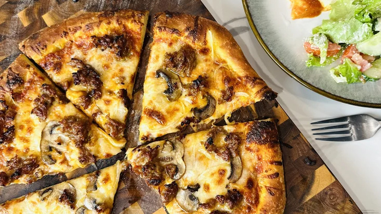 Homemade pizza with mushroom topping