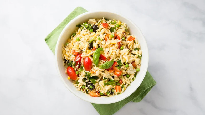 Bowl of orzo salad with veggies