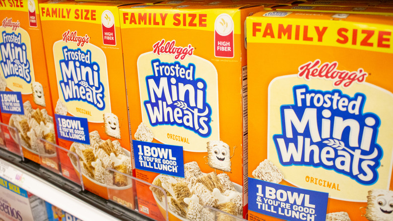 Boxes of Frosted Mini Wheats on a grocery store shelf