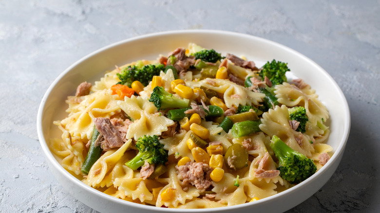 Pasta salad in a bowl with broccoli