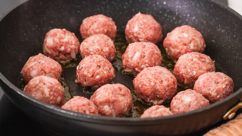 Cooking meatballs in a pan