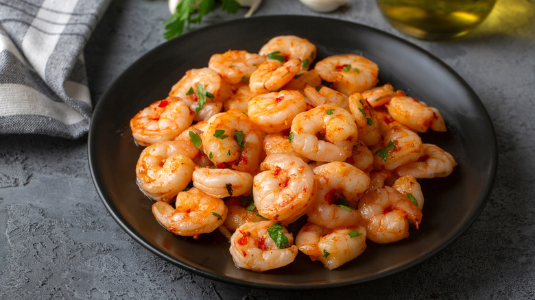 Plate of shrimp with fresh herbs