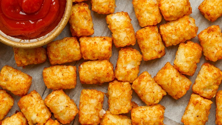 Tater tots on baking sheet 