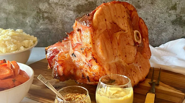Large piece of ham on a cutting board