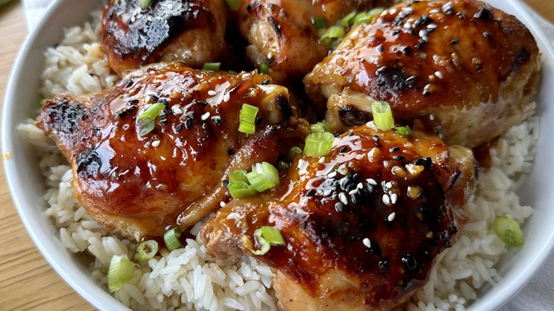 Chicken thighs over rice
