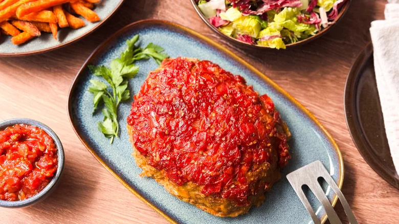 Turkey meatloaf on a plate with ketchup topping