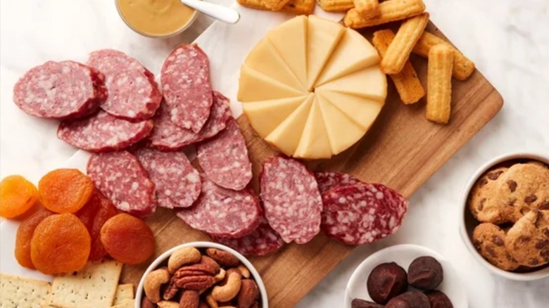 Hickory Farms Sweet & Savory Snacks Gift Basket on a charcuterie board