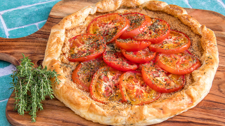Tomato pie on wooden board