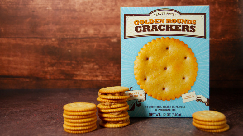 Stacks of Golden Rounds Crackers near the box