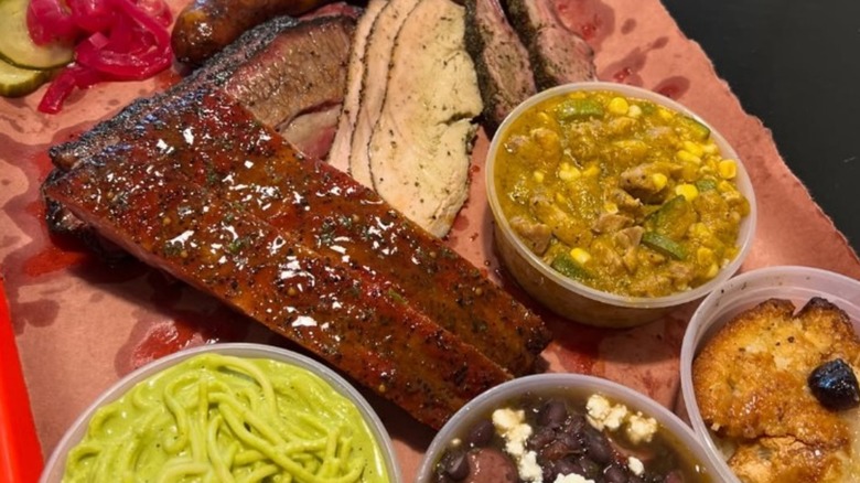 A tray of barbecued meats and sides at Barbs B Q