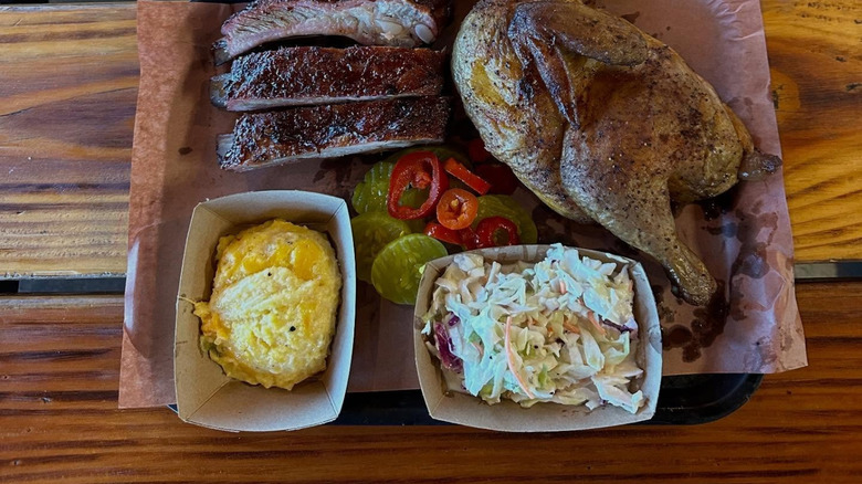 A tray of barbecued meats and sides at Evie Mae's Pit Barbeque