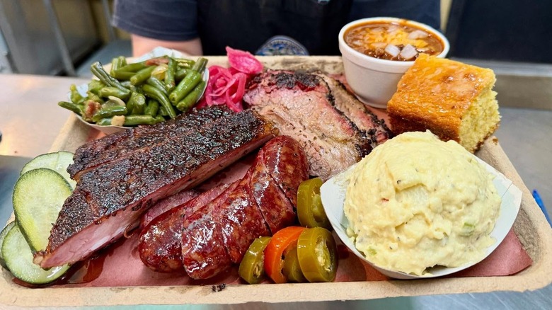A tray of barbecued meat and sides at LaVaca BBQ