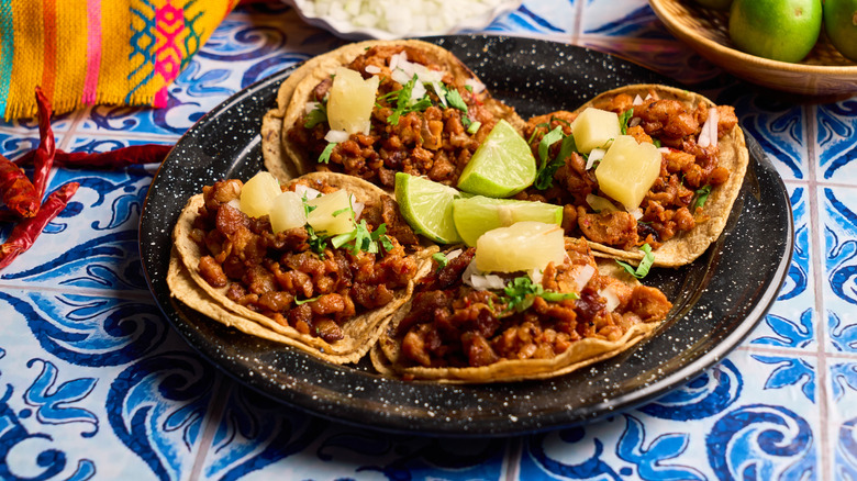 A plate of tacos al pastor