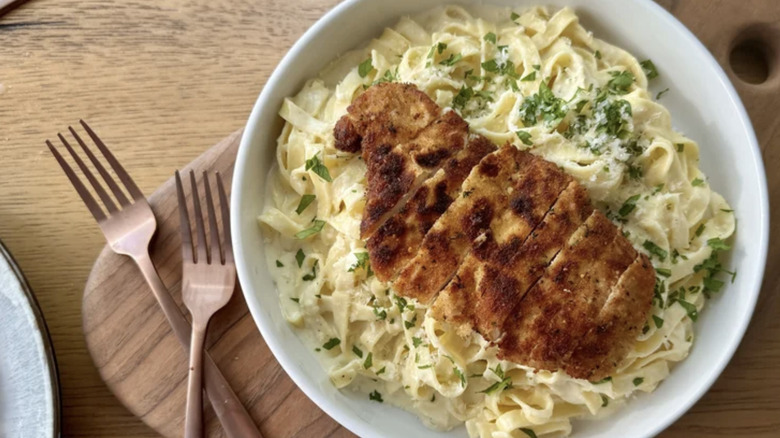 A plate of Ultra Creamy Chicken Fettuccine Alfredo