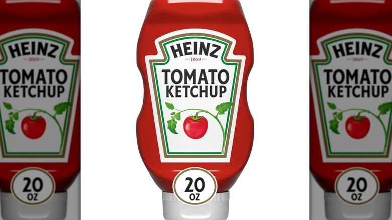 20-ounce container of Heinz tomato ketchup on a white background.