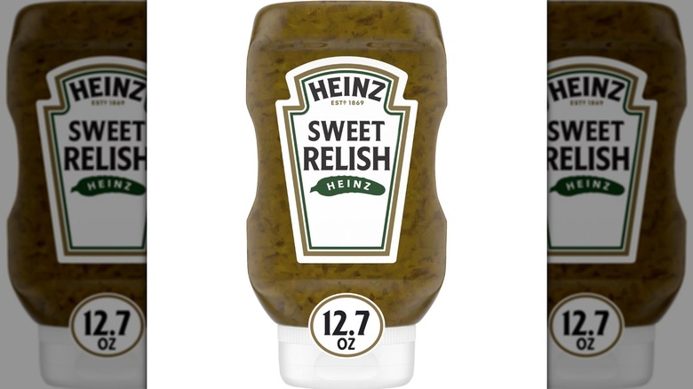 12.7-ounce container of Heinz sweet relish with a white lid on a white background.