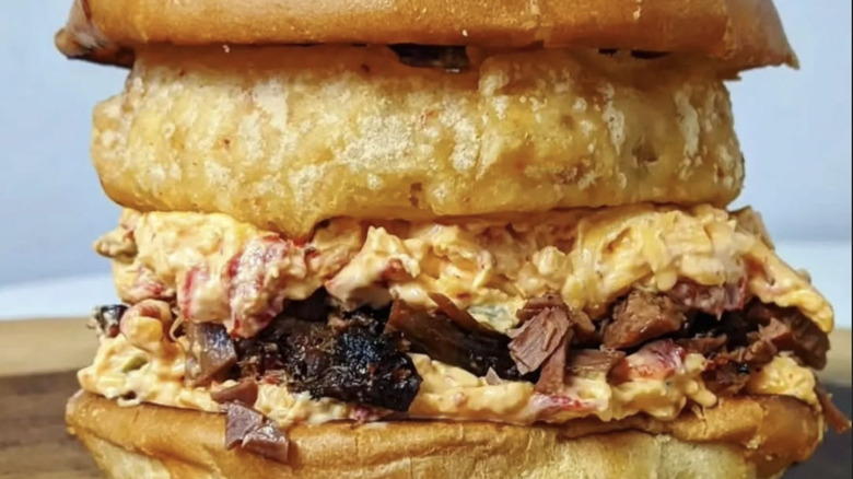 Heirloom Market BBQ brisket sandwich with pimento cheese