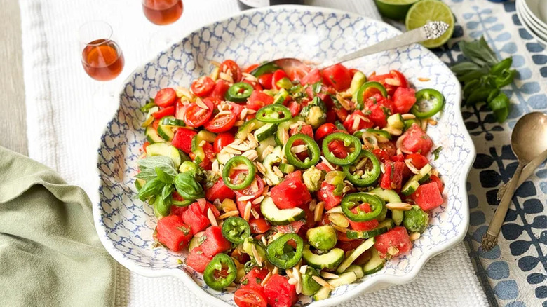 Watermelon salad with toppings in a bowl