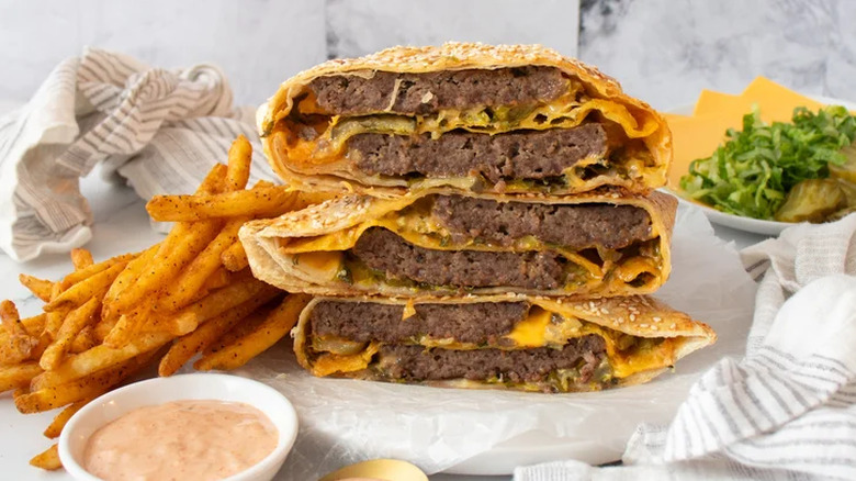 Crunch wrap with fries on a table